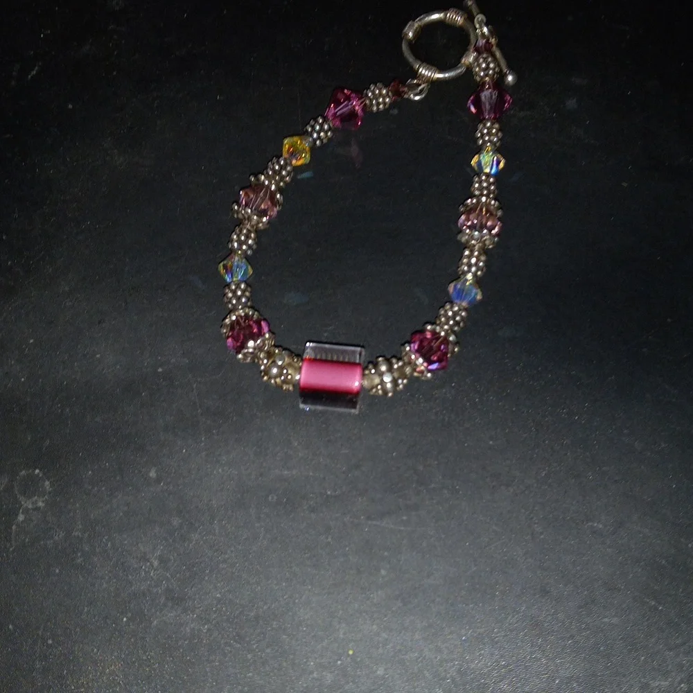 Beautiful handcrafted pinkish red glass and swasvorski crystals beads bracelet
